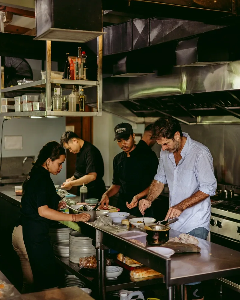 Chef Simon and the kitchen team at work in the Seed kitchen in Bingin